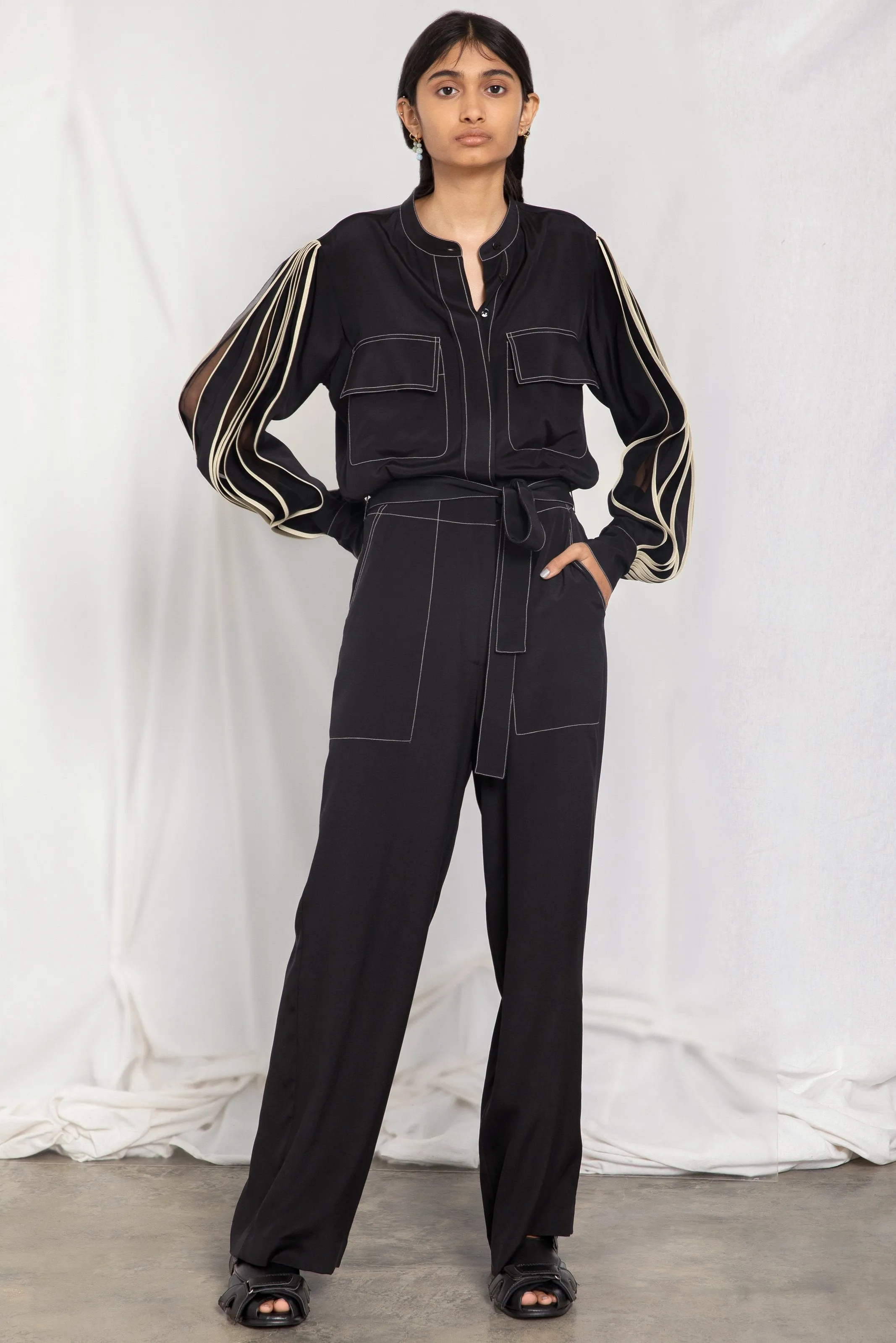 Jumpsuit with pleated sleeves