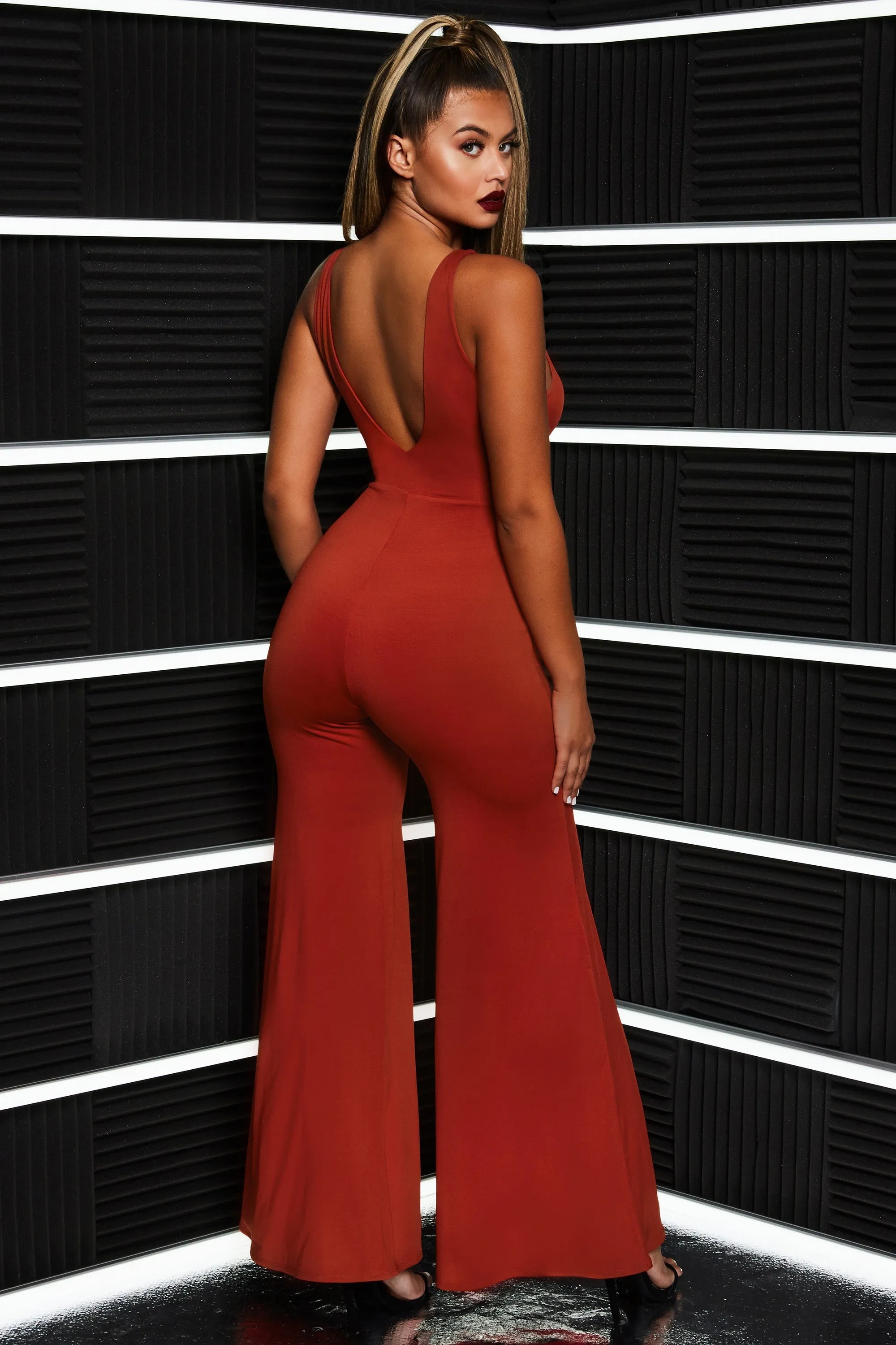 That Cuts Deep Twist Front Plunging Wide Leg Jumpsuit in Red